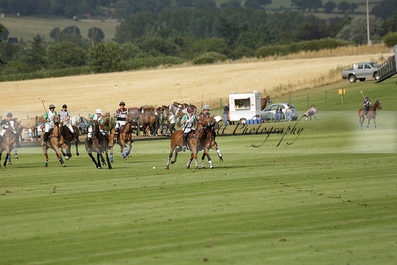 Jaeger Le Coultre (black)  v Wairakei Pastoral (white) in a Jaeger Le Coultre Holden White Cup polo match played on 29 July 2013 at Cowdray Park Polo Club on Brooksfieldwww.polopictures.co.uk