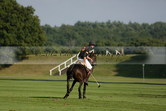 Pluma Negra (white) v Shoreline (black) in the Brecknock Cup Subsidiary final polo match played on Sunday 25 August 2013 at Cowdray Park Polo Club on Ambersham 1. 2013.10.12 www.polopictures.co.uk