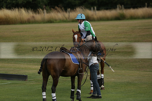 Jaeger Le Coultre (black)  v Wairakei Pastoral (white) in a Jaeger Le Coultre Holden White Cup polo match played on 29 July 2013 at Cowdray Park Polo Club on Brooksfieldwww.polopictures.co.uk