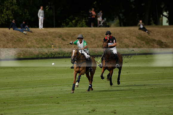 Jaeger Le Coultre (black)  v Wairakei Pastoral (white) in a Jaeger Le Coultre Holden White Cup polo match played on 29 July 2013 at Cowdray Park Polo Club on Brooksfieldwww.polopictures.co.uk