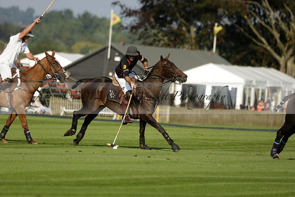 Pluma Negra (white) v Shoreline (black) in the Brecknock Cup Subsidiary final polo match played on Sunday 25 August 2013 at Cowdray Park Polo Club on Ambersham 1. 2013.10.12 www.polopictures.co.uk