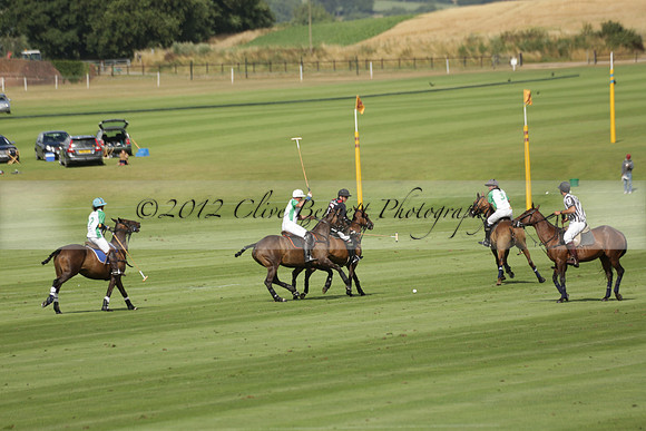 Jaeger Le Coultre (black)  v Wairakei Pastoral (white) in a Jaeger Le Coultre Holden White Cup polo match played on 29 July 2013 at Cowdray Park Polo Club on Brooksfieldwww.polopictures.co.uk