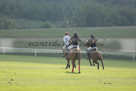 Pluma Negra (white) v Shoreline (black) in the Brecknock Cup Subsidiary final polo match played on Sunday 25 August 2013 at Cowdray Park Polo Club on Ambersham 1. 2013.10.12 www.polopictures.co.uk