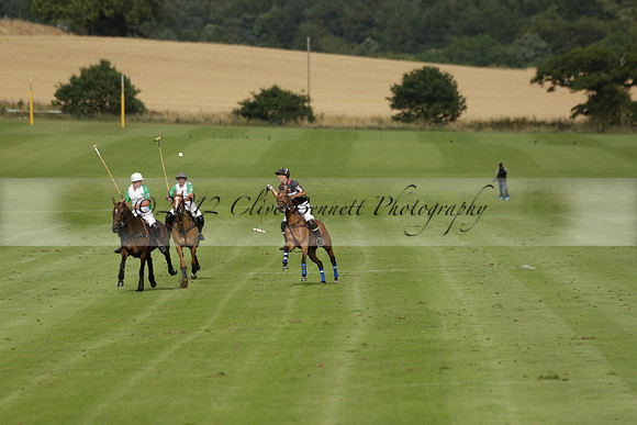 Jaeger Le Coultre (black)  v Wairakei Pastoral (white) in a Jaeger Le Coultre Holden White Cup polo match played on 29 July 2013 at Cowdray Park Polo Club on Brooksfieldwww.polopictures.co.uk