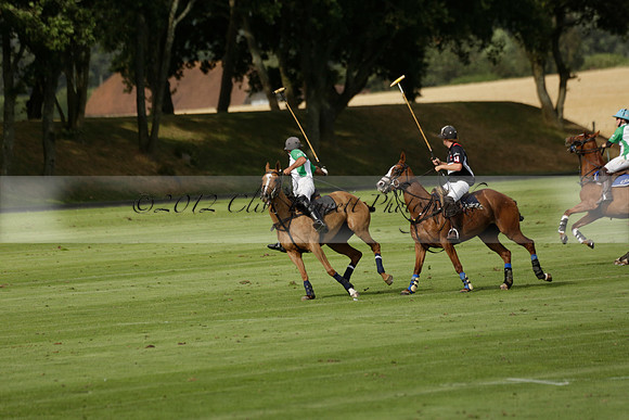 Jaeger Le Coultre (black)  v Wairakei Pastoral (white) in a Jaeger Le Coultre Holden White Cup polo match played on 29 July 2013 at Cowdray Park Polo Club on Brooksfieldwww.polopictures.co.uk