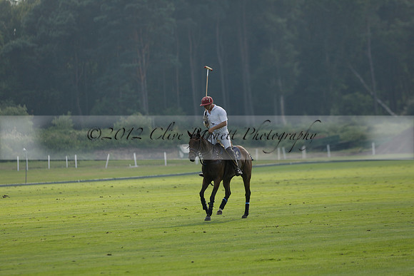 Pluma Negra (white) v Shoreline (black) in the Brecknock Cup Subsidiary final polo match played on Sunday 25 August 2013 at Cowdray Park Polo Club on Ambersham 1. 2013.10.12 www.polopictures.co.uk