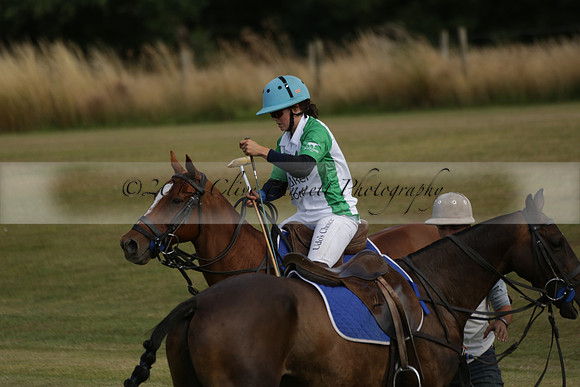Jaeger Le Coultre (black)  v Wairakei Pastoral (white) in a Jaeger Le Coultre Holden White Cup polo match played on 29 July 2013 at Cowdray Park Polo Club on Brooksfieldwww.polopictures.co.uk