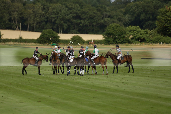 Jaeger Le Coultre (black)  v Wairakei Pastoral (white) in a Jaeger Le Coultre Holden White Cup polo match played on 29 July 2013 at Cowdray Park Polo Club on Brooksfieldwww.polopictures.co.uk