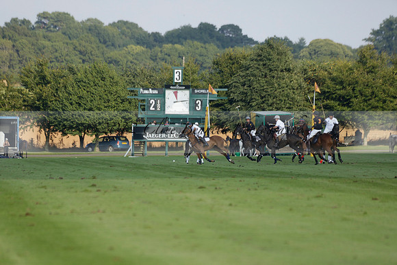 Pluma Negra (white) v Shoreline (black) in the Brecknock Cup Subsidiary final polo match played on Sunday 25 August 2013 at Cowdray Park Polo Club on Ambersham 1. 2013.10.12 www.polopictures.co.uk