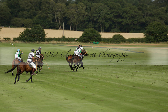 Jaeger Le Coultre (black)  v Wairakei Pastoral (white) in a Jaeger Le Coultre Holden White Cup polo match played on 29 July 2013 at Cowdray Park Polo Club on Brooksfieldwww.polopictures.co.uk