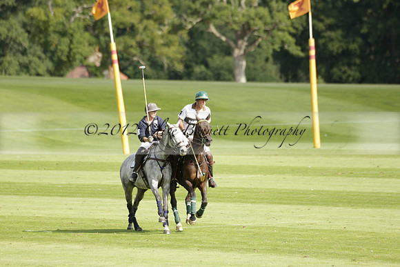 Pandas (white) v Home Farm (navy) in a Park House West Sussex Cup Polo match on Brooksfield at Cowdray Park Polo Club on Friday 30 August 2013. 2013.08.30 www.polopictures.co.uk