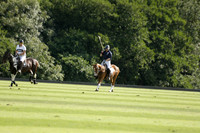 Pandas (white) v Home Farm (navy) in a Park House West Sussex Cup Polo match on Brooksfield at Cowdray Park Polo Club on Friday 30 August 2013. 2013.08.30 www.polopictures.co.uk