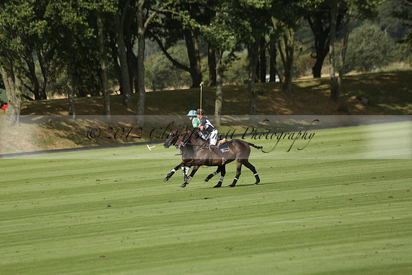 Jaeger Le Coultre (black)  v Wairakei Pastoral (white) in a Jaeger Le Coultre Holden White Cup polo match played on 29 July 2013 at Cowdray Park Polo Club on Brooksfieldwww.polopictures.co.uk