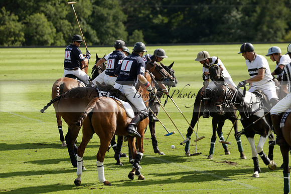 Pandas (white) v Home Farm (navy) in a Park House West Sussex Cup Polo match on Brooksfield at Cowdray Park Polo Club on Friday 30 August 2013. 2013.08.30 www.polopictures.co.uk