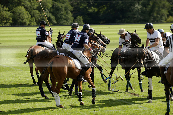 Pandas (white) v Home Farm (navy) in a Park House West Sussex Cup Polo match on Brooksfield at Cowdray Park Polo Club on Friday 30 August 2013. 2013.08.30 www.polopictures.co.uk