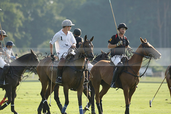 Pluma Negra (white) v Shoreline (black) in the Brecknock Cup Subsidiary final polo match played on Sunday 25 August 2013 at Cowdray Park Polo Club on Ambersham 1. 2013.10.12 www.polopictures.co.uk