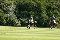 Pandas (white) v Home Farm (navy) in a Park House West Sussex Cup Polo match on Brooksfield at Cowdray Park Polo Club on Friday 30 August 2013. 2013.08.30 www.polopictures.co.uk
