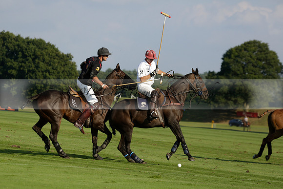 Pluma Negra (white) v Shoreline (black) in the Brecknock Cup Subsidiary final polo match played on Sunday 25 August 2013 at Cowdray Park Polo Club on Ambersham 1. 2013.10.12 www.polopictures.co.uk