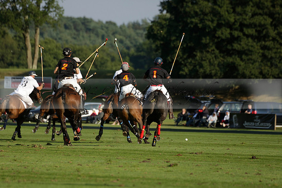 Pluma Negra (white) v Shoreline (black) in the Brecknock Cup Subsidiary final polo match played on Sunday 25 August 2013 at Cowdray Park Polo Club on Ambersham 1. 2013.10.12 www.polopictures.co.uk