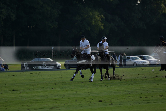 Pluma Negra (white) v Shoreline (black) in the Brecknock Cup Subsidiary final polo match played on Sunday 25 August 2013 at Cowdray Park Polo Club on Ambersham 1. 2013.10.12 www.polopictures.co.uk