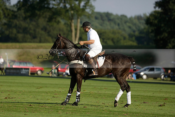 Pluma Negra (white) v Shoreline (black) in the Brecknock Cup Subsidiary final polo match played on Sunday 25 August 2013 at Cowdray Park Polo Club on Ambersham 1. 2013.10.12 www.polopictures.co.uk