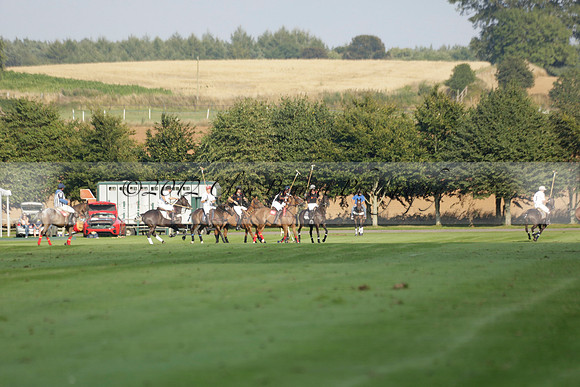 Pluma Negra (white) v Shoreline (black) in the Brecknock Cup Subsidiary final polo match played on Sunday 25 August 2013 at Cowdray Park Polo Club on Ambersham 1. 2013.10.12 www.polopictures.co.uk