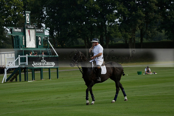 Pluma Negra (white) v Shoreline (black) in the Brecknock Cup Subsidiary final polo match played on Sunday 25 August 2013 at Cowdray Park Polo Club on Ambersham 1. 2013.10.12 www.polopictures.co.uk