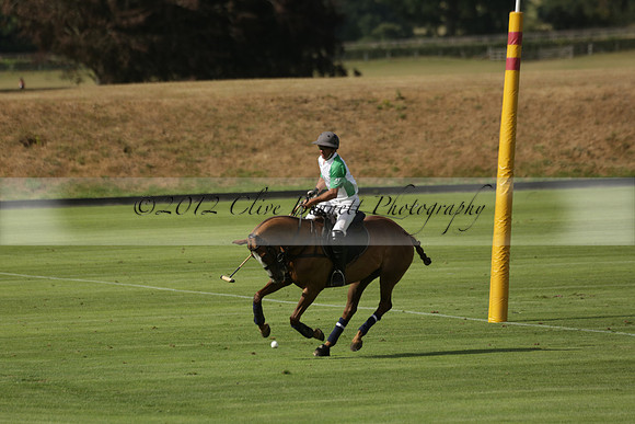 Jaeger Le Coultre (black)  v Wairakei Pastoral (white) in a Jaeger Le Coultre Holden White Cup polo match played on 29 July 2013 at Cowdray Park Polo Club on Brooksfieldwww.polopictures.co.uk