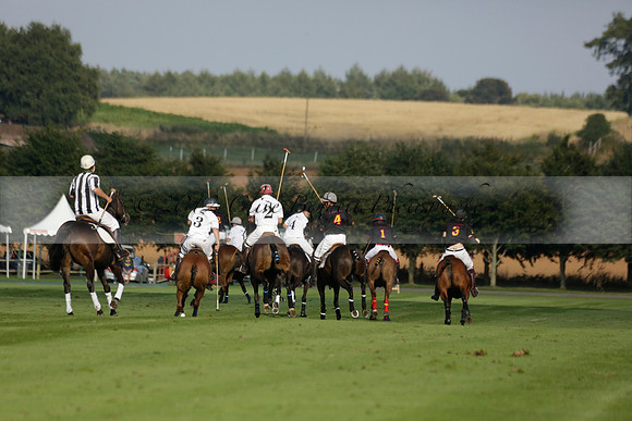 Pluma Negra (white) v Shoreline (black) in the Brecknock Cup Subsidiary final polo match played on Sunday 25 August 2013 at Cowdray Park Polo Club on Ambersham 1. 2013.10.12 www.polopictures.co.uk