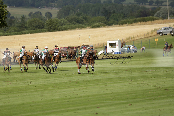 Jaeger Le Coultre (black)  v Wairakei Pastoral (white) in a Jaeger Le Coultre Holden White Cup polo match played on 29 July 2013 at Cowdray Park Polo Club on Brooksfieldwww.polopictures.co.uk