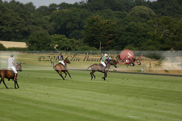 Jaeger Le Coultre (black)  v Wairakei Pastoral (white) in a Jaeger Le Coultre Holden White Cup polo match played on 29 July 2013 at Cowdray Park Polo Club on Brooksfieldwww.polopictures.co.uk