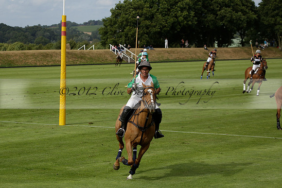 Jaeger Le Coultre (black)  v Wairakei Pastoral (white) in a Jaeger Le Coultre Holden White Cup polo match played on 29 July 2013 at Cowdray Park Polo Club on Brooksfieldwww.polopictures.co.uk