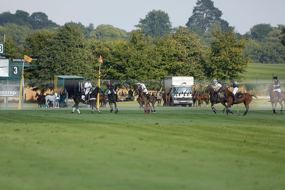 Pluma Negra (white) v Shoreline (black) in the Brecknock Cup Subsidiary final polo match played on Sunday 25 August 2013 at Cowdray Park Polo Club on Ambersham 1. 2013.10.12 www.polopictures.co.uk