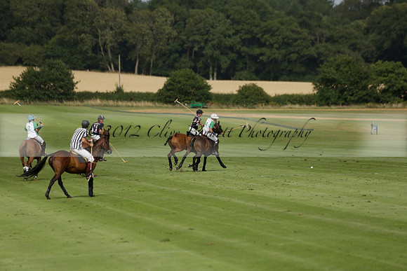 Jaeger Le Coultre (black)  v Wairakei Pastoral (white) in a Jaeger Le Coultre Holden White Cup polo match played on 29 July 2013 at Cowdray Park Polo Club on Brooksfieldwww.polopictures.co.uk